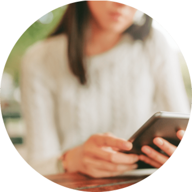 Woman using her smartphone image