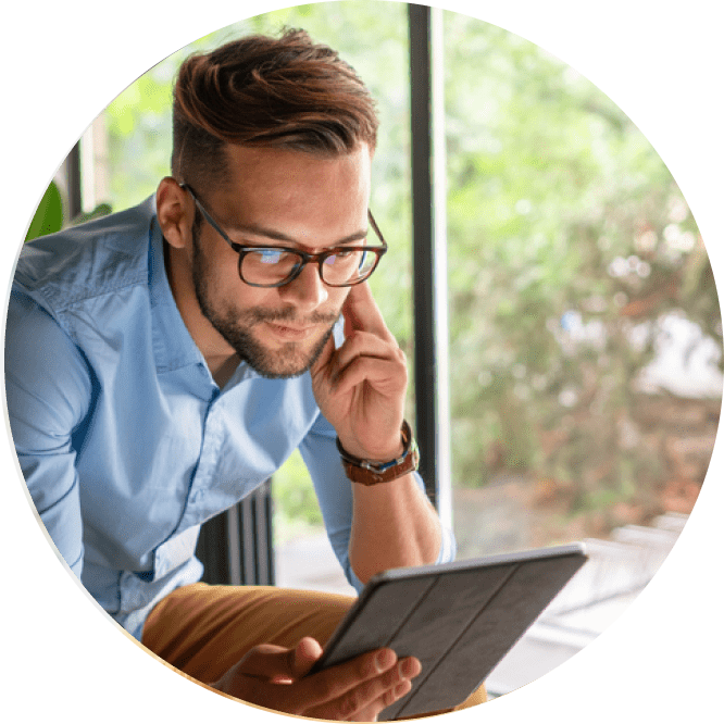 Man scrolling through his tablet image